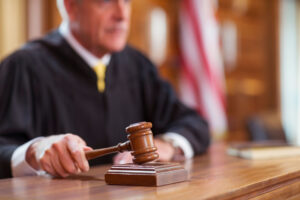 Judge banging gavel in court